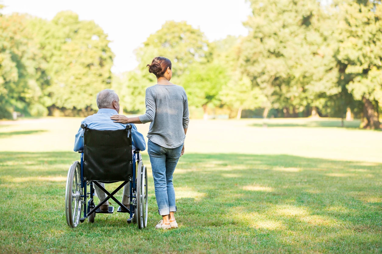 A caregiver with an elder